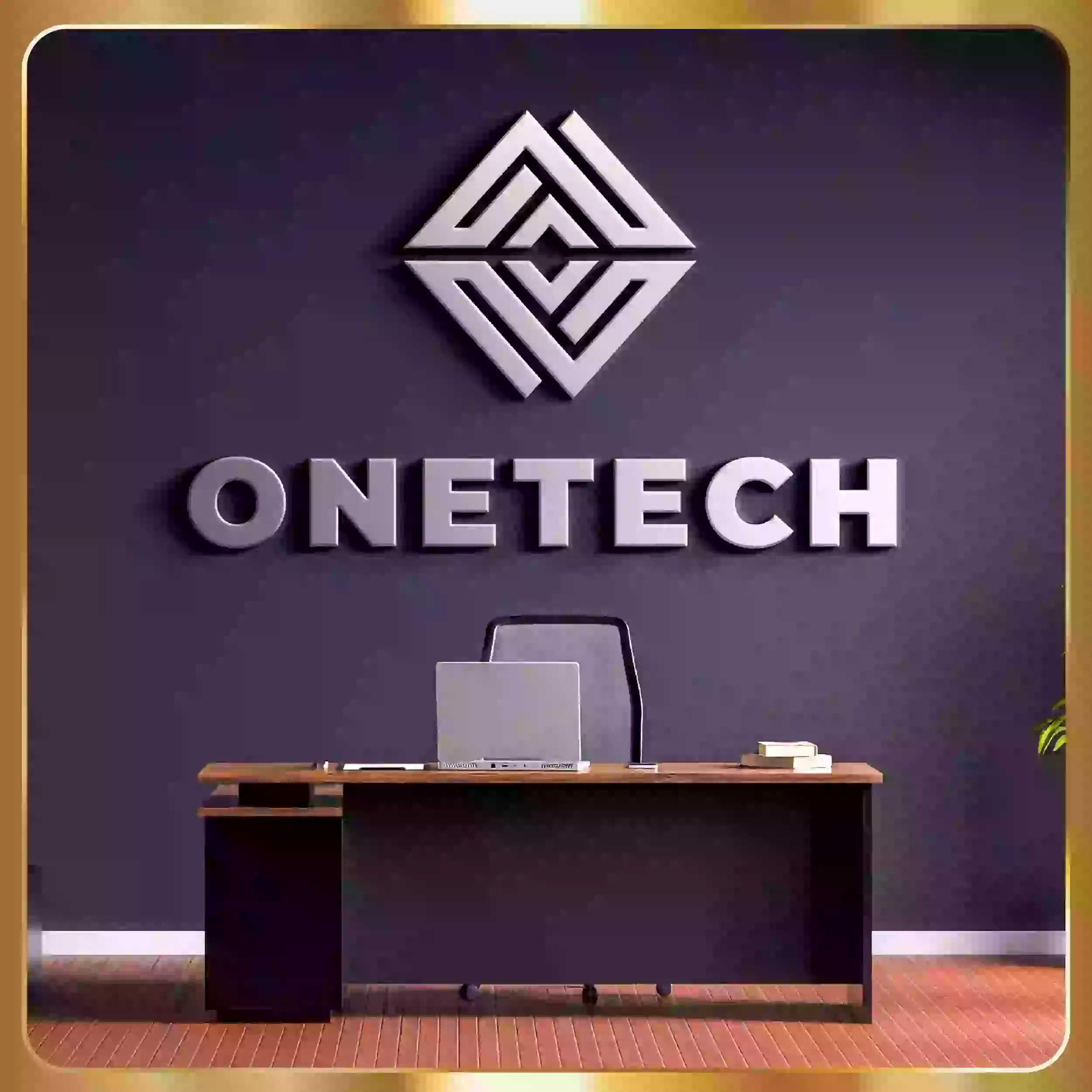 The logo for design advertising is on a desk in a room.